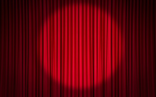 Red curtain with spotlight