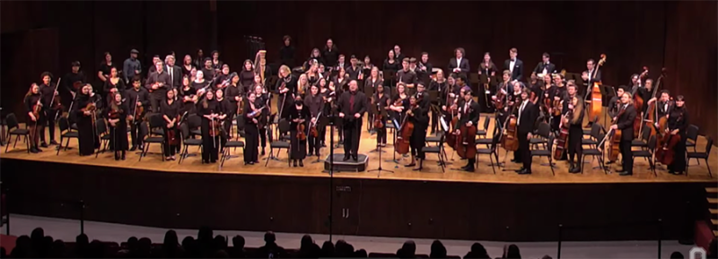 Campus Orchestra onstage with Jae Park, conductor