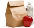 Sack lunch with water bottle and apple