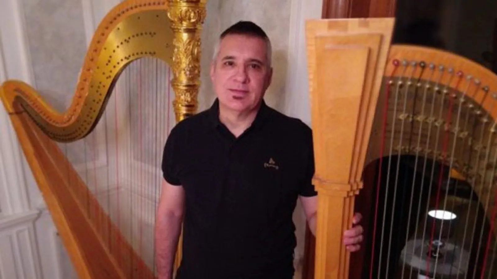 Guest harpist Oscar Rodiguez Do Campo