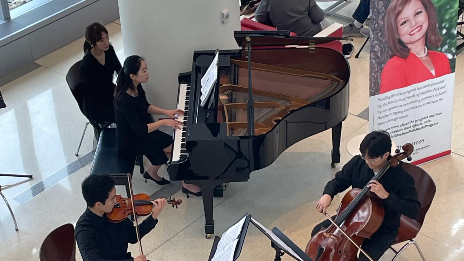 Student violinist, cellist and pianist performing