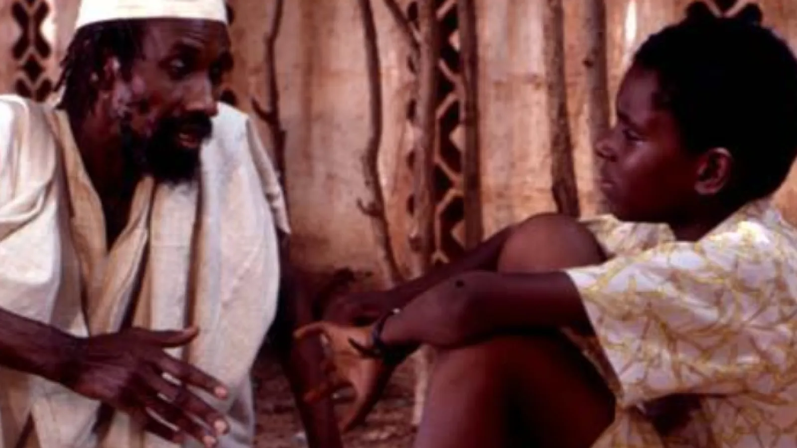 Griot teaching young Keita (image from the film)