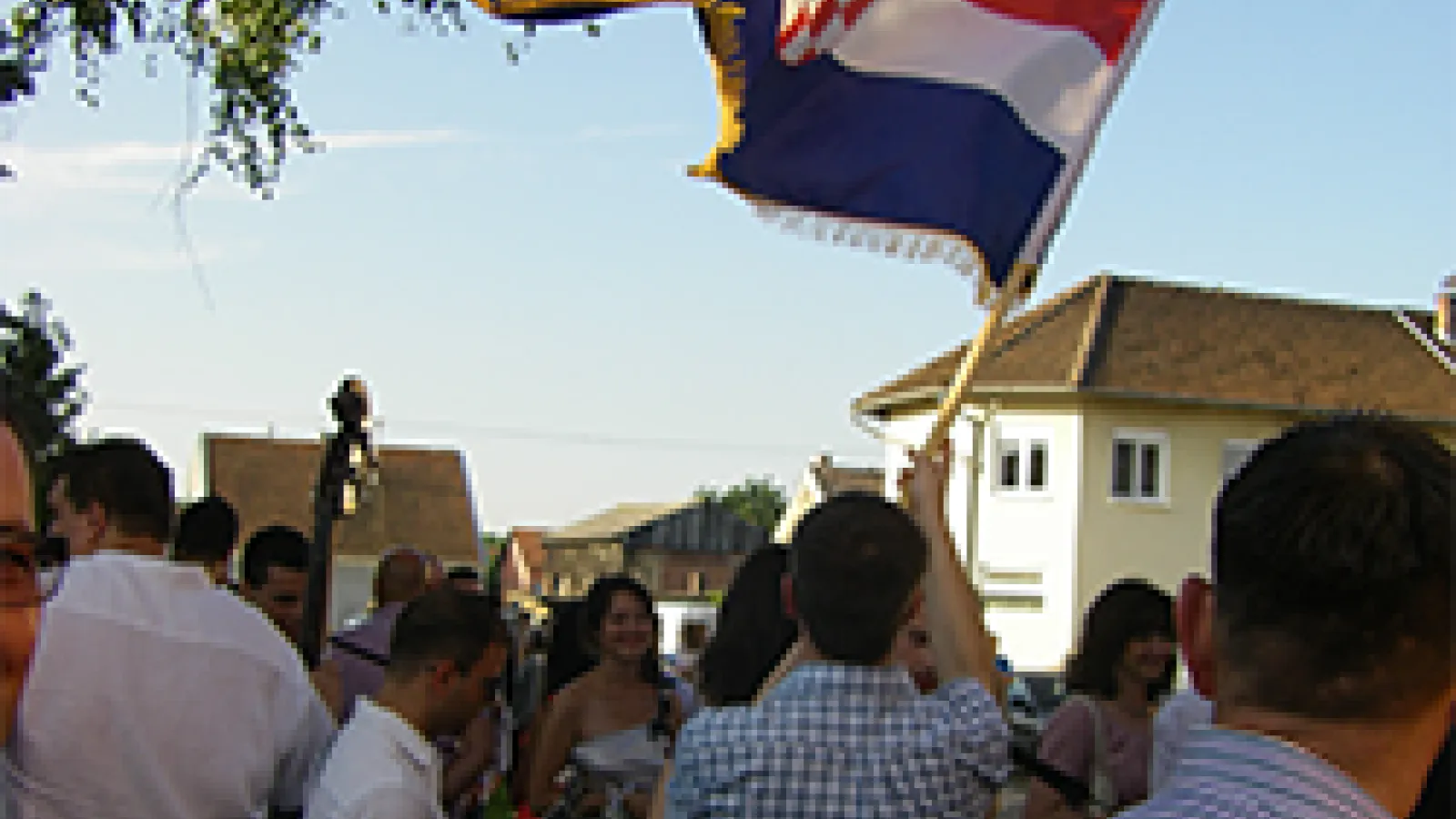 Crowd waving Croation flag