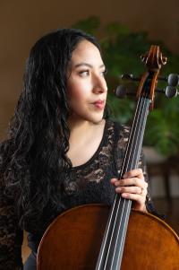 Instructor holding cello