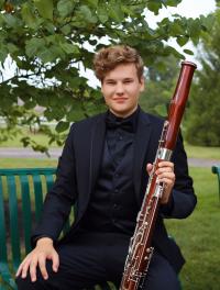 Musician holding a bassoon