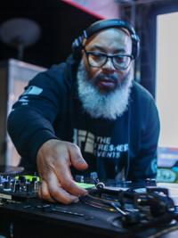 Man operating a turntable