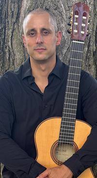 Man holding guitar