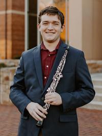 Musician holding an oboe