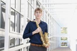 Man holding saxophone