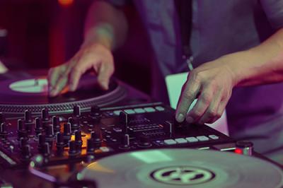 DJ hands at turntables