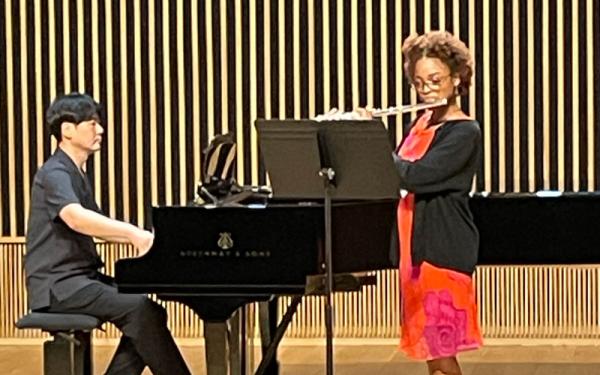 Pianist and flutist performing