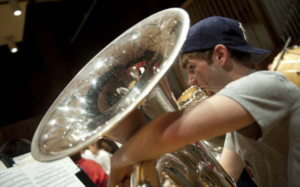 Student playing euphonium in band
