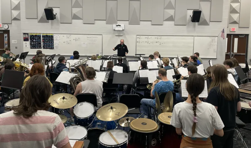 David Hedgecoth directing the high school band