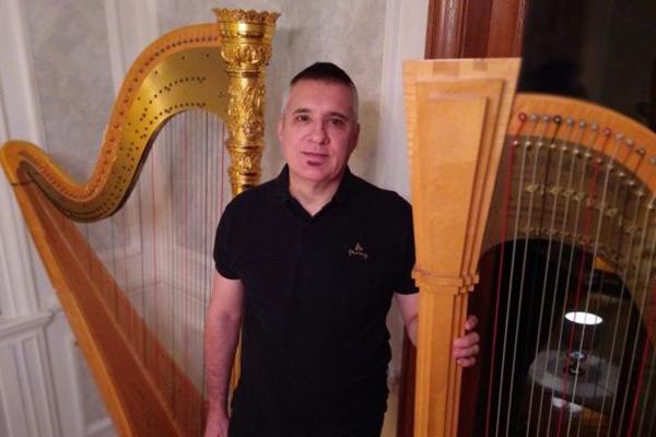 Guest harpist Oscar Rodiguez Do Campo
