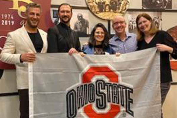Ohio State delegation in Brazil, holding Block O flag