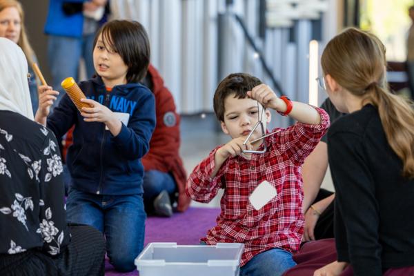 Children playing with percussion instruments