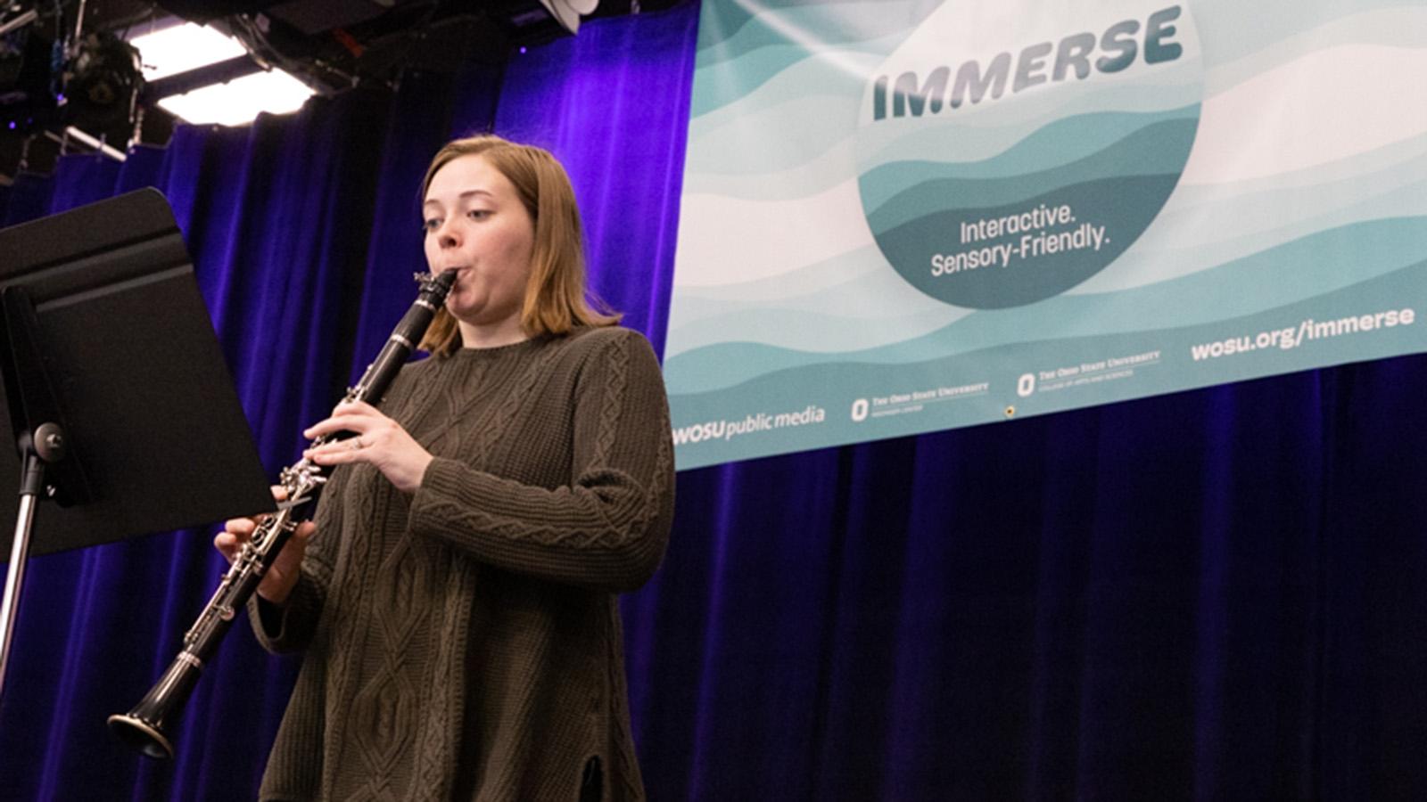 Clarinetist Kaleigh performing at Immerse concert