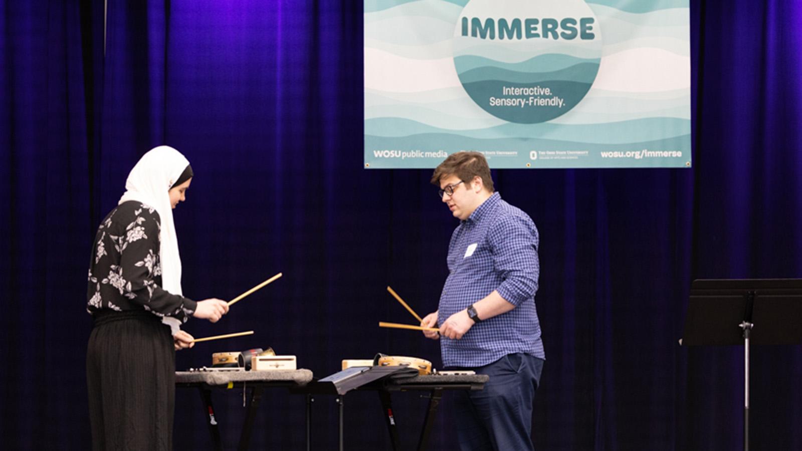 Percussionists Hannah and Sam performing at Immerse concert