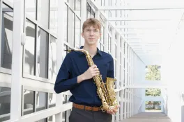 Man holding saxophone