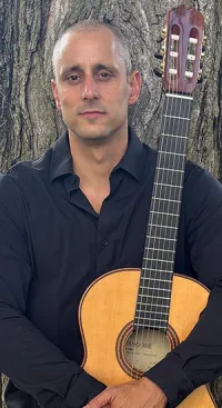 Man holding guitar