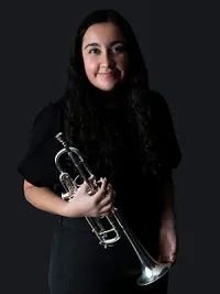 Woman holding trumpet