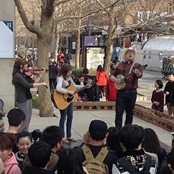 Trio performing in China square Trio performing in China square