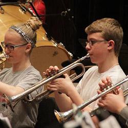 Middle school students in band rehearsal Middle school students in band rehearsal